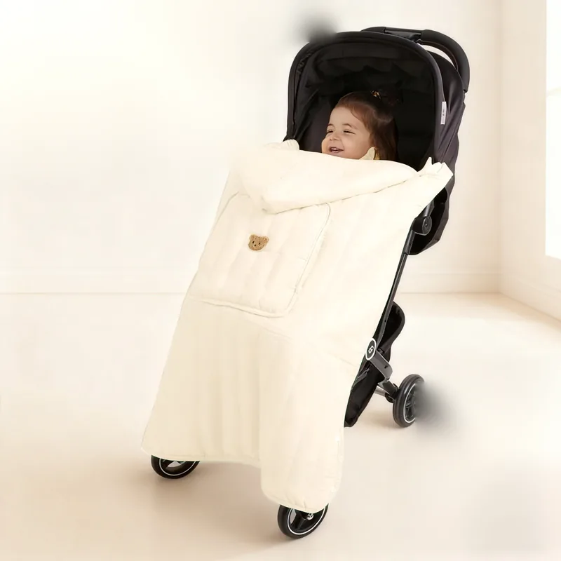 CB-01 in off-white over a stroller