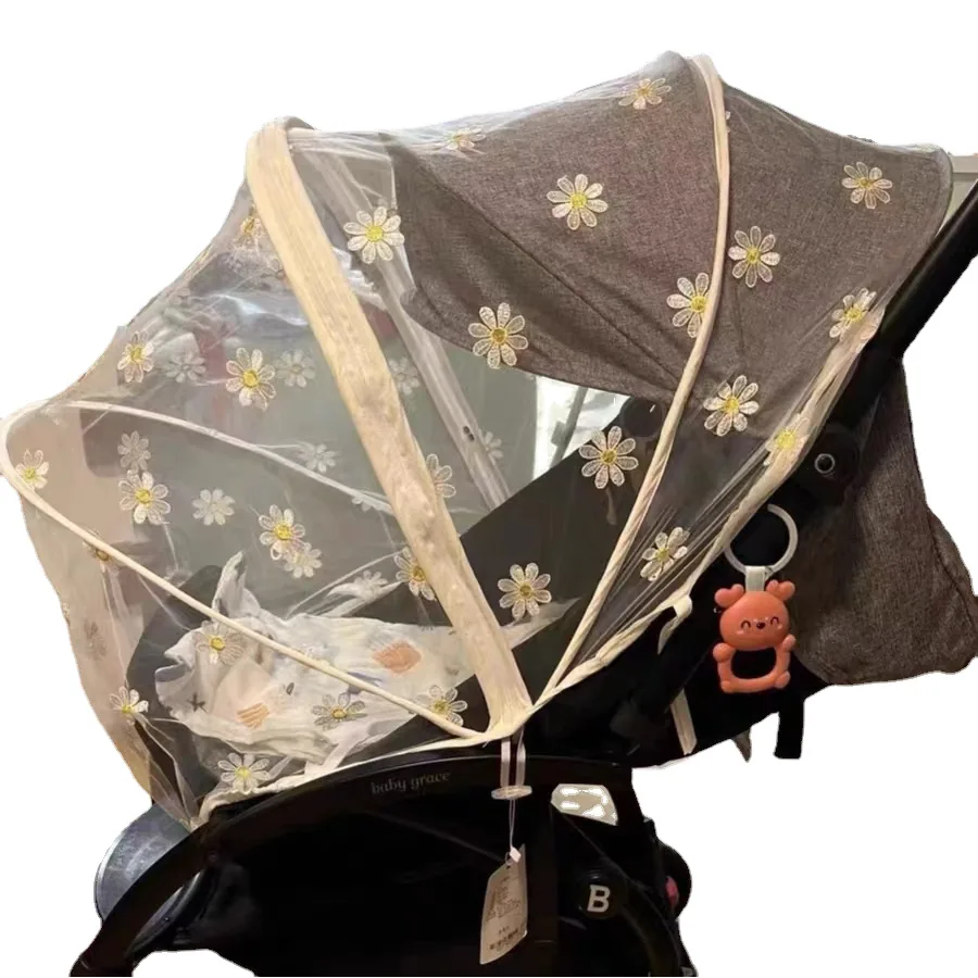 MN-02 in beige over a dark stroller