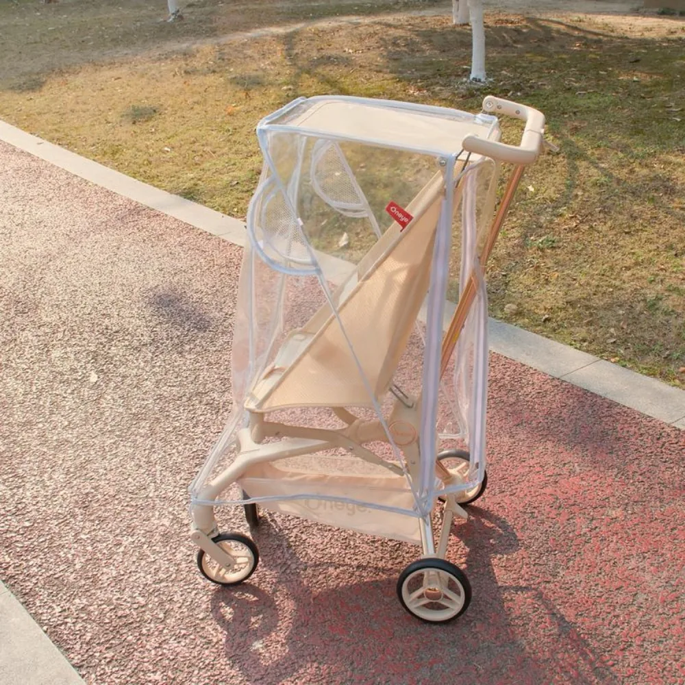 RC-01 rain cover on a compact stroller, silver edge