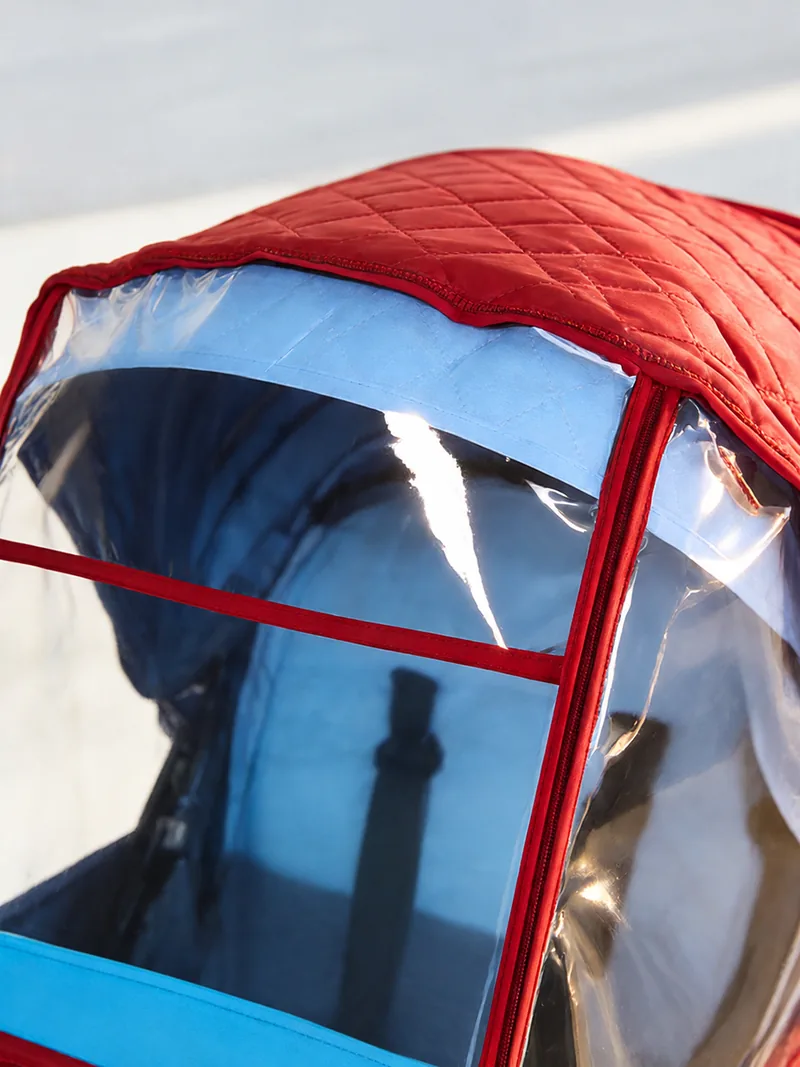 Clear window set into diamond-quilted fabric